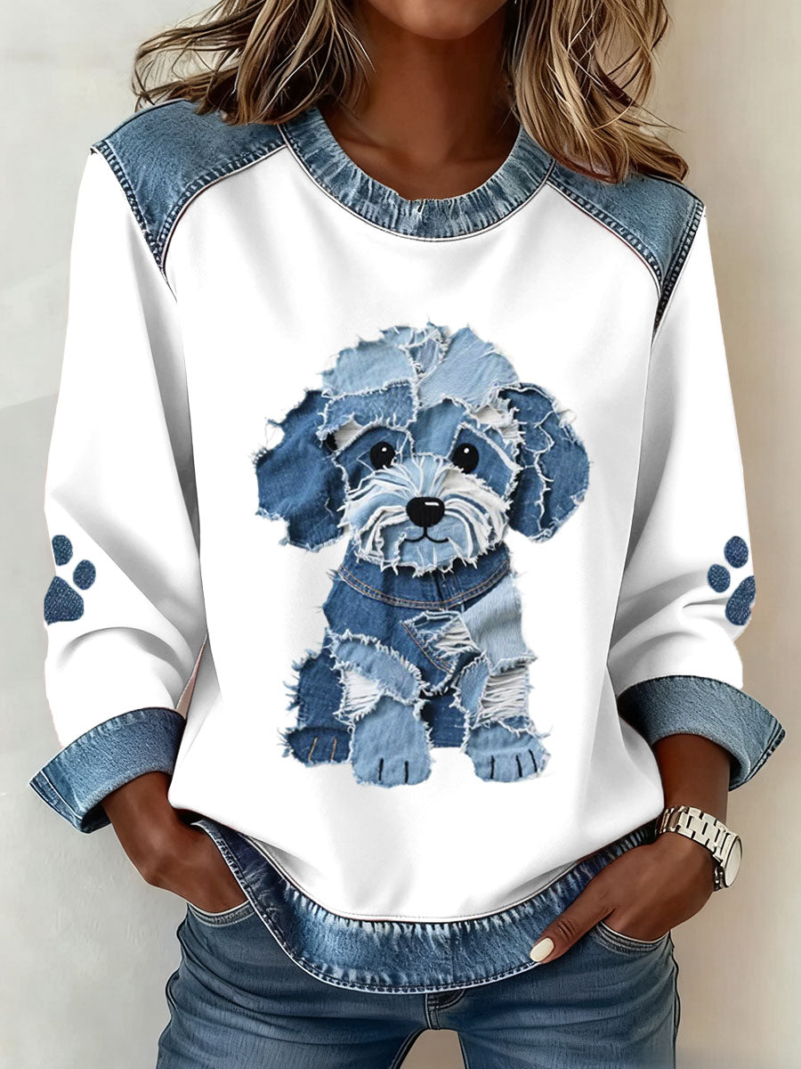 Ladies sweatshirt with patchwork pattern and denim print of a hairy dog