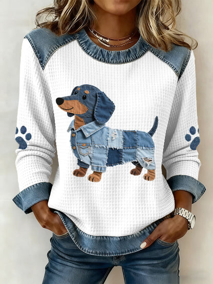 Ladies sweatshirt with patchwork pattern in a beautiful dachshund design
